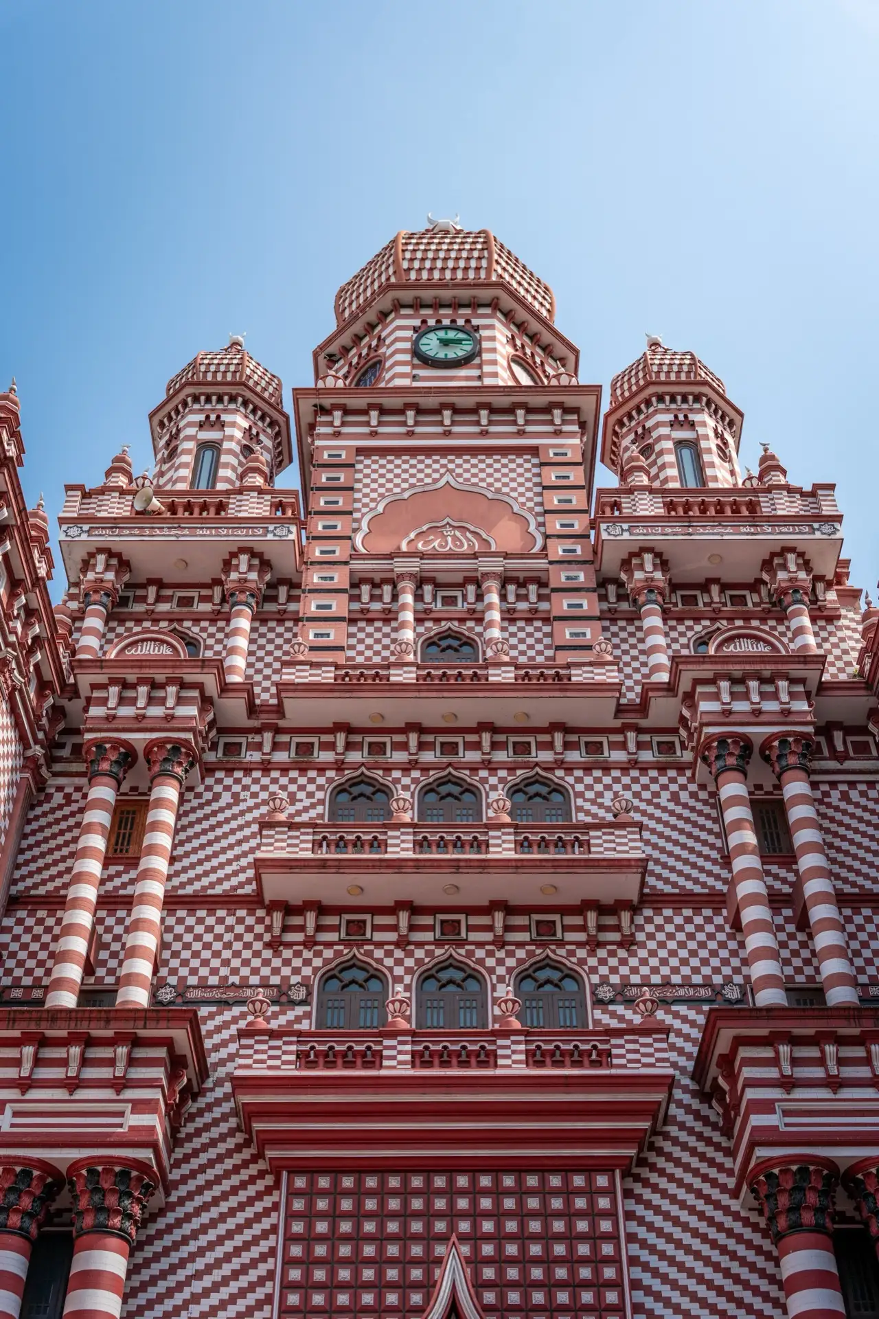 The red and white patterned facade of Jami Ul-Alfar Mosque in Colombo.